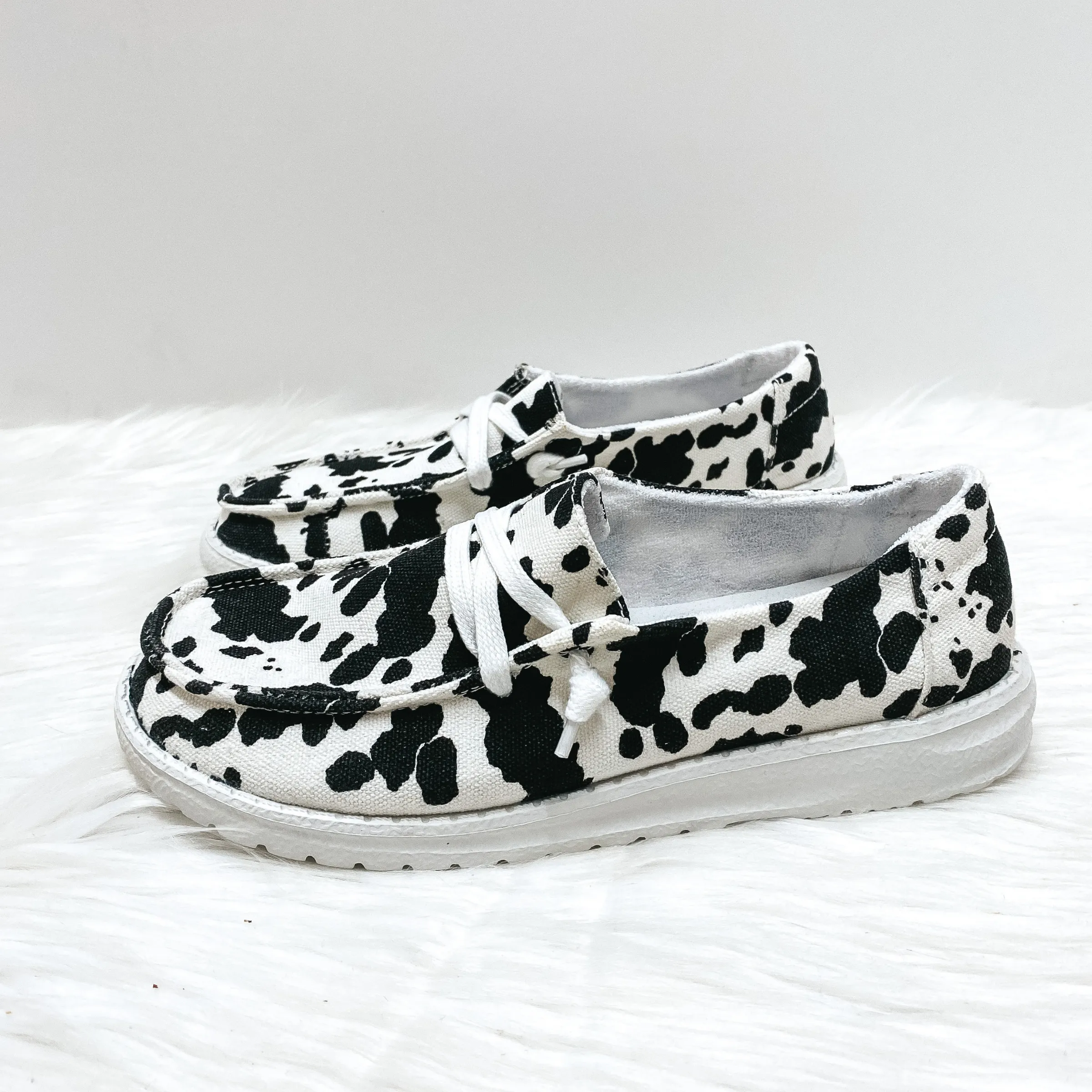 Very G | Have To Run Cow Print Slip On Loafers with Laces in Black